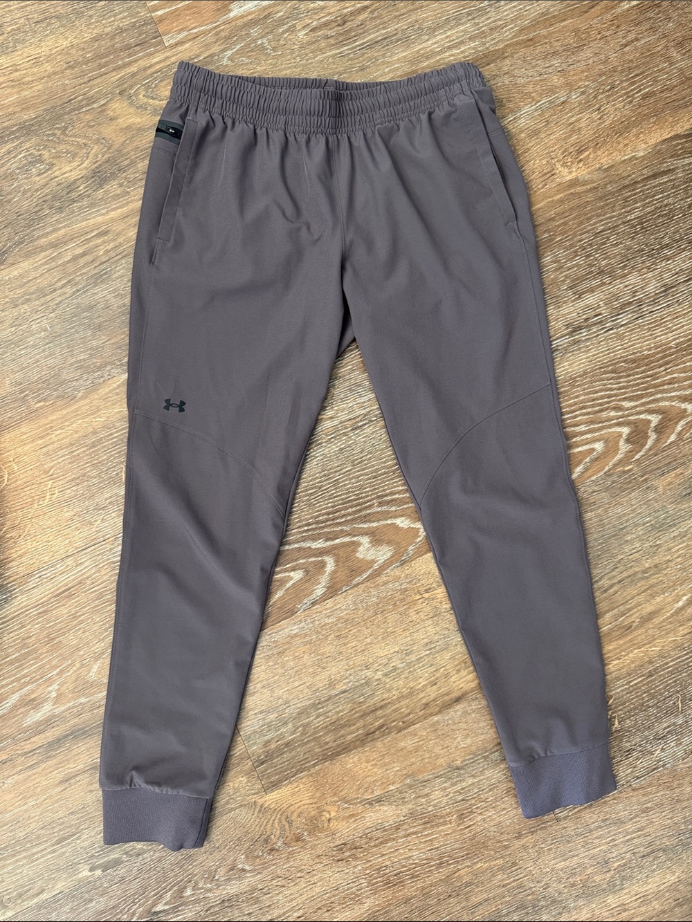 Under Armour women’s Performance Jogger Pants, light plum/gray color. Like new!